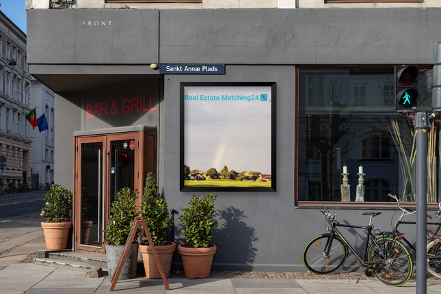 The Rainbow Sinari Poster with Real Estate Matching24 Logo