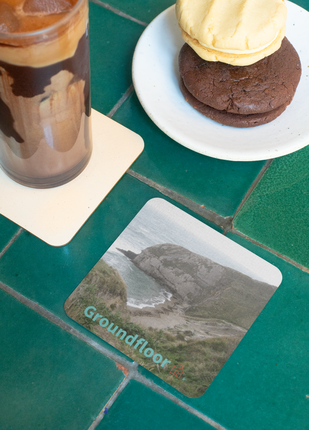 Sea & Hills Cork-back coaster with Groundfloor with House Logo