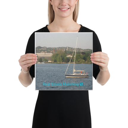 Boat on the River Canvas with realestatematching with key Logo