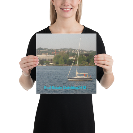 Boat on the River Canvas with realestatematching24 with key Logo