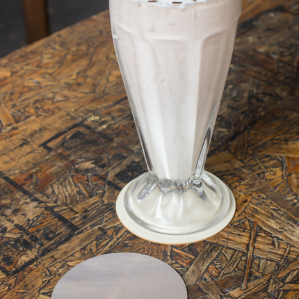 The Rainbow Sinari Cork-back coaster with Groundfloor24 Logo