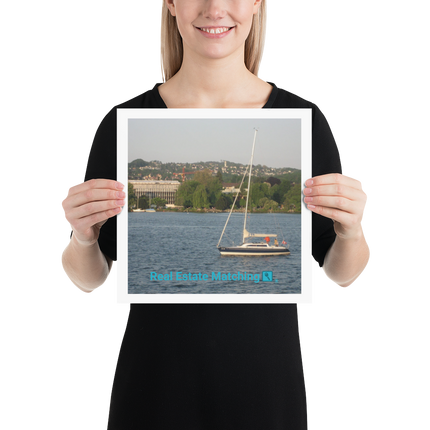 Boat on the River Poster with realestatematching with key Logo