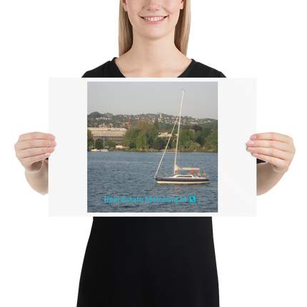 Boat on the River Poster with realestatematching24 with key Logo