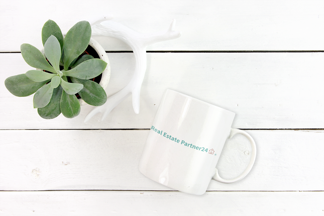 White glossy mug with Real Estate Partner24 Logo