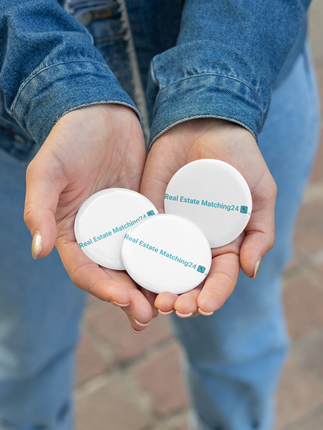 Set of pin buttons with Real Estate Matching24 Logo