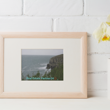 Seaside Serenity Framed canvas with realestatepartner24 with house Logo