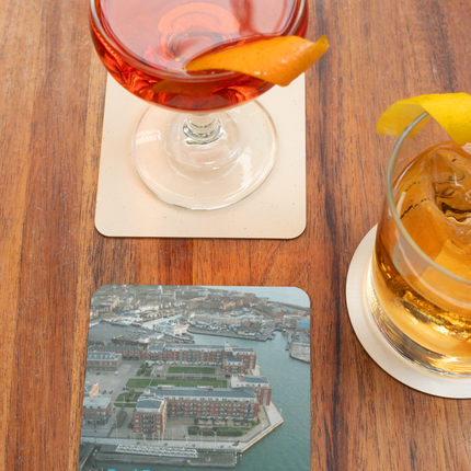 Nice City Cork-back coaster with realestatematching with key Logo