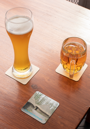Village Charm Cork-back coaster with realestatematching24 with key Logo