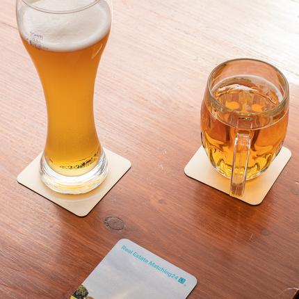 The Rainbow Sinari Cork-back coaster with Real Estate Matching Logo